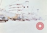 Image of Unloading of oil barrels Saigon Vietnam, 1966, second 23 stock footage video 65675037335
