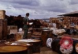 Image of oil barrels Saigon Vietnam, 1966, second 7 stock footage video 65675037340