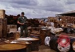 Image of oil barrels Saigon Vietnam, 1966, second 12 stock footage video 65675037340