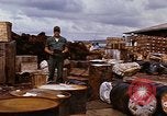 Image of oil barrels Saigon Vietnam, 1966, second 14 stock footage video 65675037340