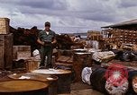 Image of oil barrels Saigon Vietnam, 1966, second 16 stock footage video 65675037340