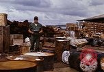 Image of oil barrels Saigon Vietnam, 1966, second 17 stock footage video 65675037340