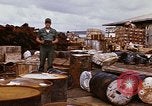 Image of oil barrels Saigon Vietnam, 1966, second 31 stock footage video 65675037340