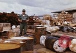 Image of oil barrels Saigon Vietnam, 1966, second 33 stock footage video 65675037340