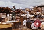 Image of oil barrels Saigon Vietnam, 1966, second 34 stock footage video 65675037340