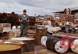 Image of oil barrels Saigon Vietnam, 1966, second 41 stock footage video 65675037340