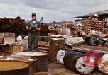Image of oil barrels Saigon Vietnam, 1966, second 47 stock footage video 65675037340