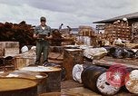 Image of oil barrels Saigon Vietnam, 1966, second 50 stock footage video 65675037340