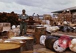 Image of oil barrels Saigon Vietnam, 1966, second 52 stock footage video 65675037340