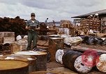 Image of oil barrels Saigon Vietnam, 1966, second 53 stock footage video 65675037340