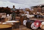 Image of oil barrels Saigon Vietnam, 1966, second 54 stock footage video 65675037340
