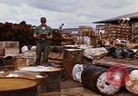 Image of oil barrels Saigon Vietnam, 1966, second 55 stock footage video 65675037340