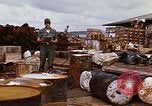 Image of oil barrels Saigon Vietnam, 1966, second 56 stock footage video 65675037340