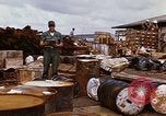 Image of oil barrels Saigon Vietnam, 1966, second 57 stock footage video 65675037340