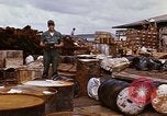 Image of oil barrels Saigon Vietnam, 1966, second 58 stock footage video 65675037340
