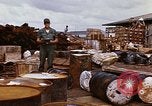 Image of oil barrels Saigon Vietnam, 1966, second 60 stock footage video 65675037340