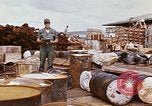 Image of oil barrels Saigon Vietnam, 1966, second 61 stock footage video 65675037340