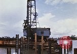 Image of Port construction Saigon Vietnam, 1966, second 32 stock footage video 65675037341