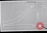 Image of Secret Service film retraces route of President Kennedy motorcade when he was assassinated Dallas Texas USA, 1964, second 9 stock footage video 65675037380