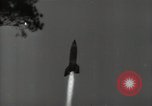 Image of A German V-2 missile is launched from site in forest Blizna Poland, 1944, second 17 stock footage video 65675037463