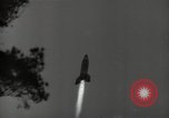Image of A German V-2 missile is launched from site in forest Blizna Poland, 1944, second 18 stock footage video 65675037463