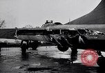 Image of damaged B-17 aircraft United Kingdom, 1945, second 15 stock footage video 65675037580