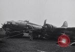 Image of damaged B-17 aircraft United Kingdom, 1945, second 42 stock footage video 65675037580