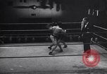 Image of boxing match United Kingdom, 1945, second 41 stock footage video 65675037581