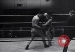 Image of boxing match United Kingdom, 1945, second 57 stock footage video 65675037581