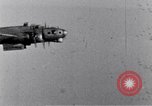 Standbild US B-17 Flugzeuge bombardieren German Submarine Yard Bremen Deutschland, 1945, aus Sekunde 38 historischem Filmmaterial Videoclip 65675037601
