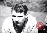 Image of American soldiers escaped from Japanese prison camp Morotai Island, 1945, second 4 stock footage video 65675037626