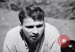 Image of American soldiers escaped from Japanese prison camp Morotai Island, 1945, second 15 stock footage video 65675037626