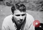 Image of American soldiers escaped from Japanese prison camp Morotai Island, 1945, second 16 stock footage video 65675037626