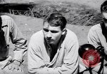 Image of American soldiers escaped from Japanese prison camp Morotai Island, 1945, second 26 stock footage video 65675037626