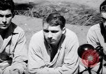 Image of American soldiers escaped from Japanese prison camp Morotai Island, 1945, second 32 stock footage video 65675037626