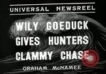 Image of goeduck clam digging Tacoma Washington USA, 1935, second 8 stock footage video 65675037671