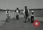 Image of goeduck clam digging Tacoma Washington USA, 1935, second 14 stock footage video 65675037671