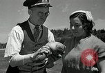 Image of goeduck clam digging Tacoma Washington USA, 1935, second 23 stock footage video 65675037671