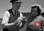 Image of goeduck clam digging Tacoma Washington USA, 1935, second 24 stock footage video 65675037671