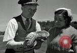 Image of goeduck clam digging Tacoma Washington USA, 1935, second 25 stock footage video 65675037671