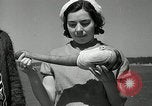 Image of goeduck clam digging Tacoma Washington USA, 1935, second 37 stock footage video 65675037671