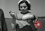 Image of goeduck clam digging Tacoma Washington USA, 1935, second 38 stock footage video 65675037671