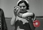 Image of goeduck clam digging Tacoma Washington USA, 1935, second 40 stock footage video 65675037671