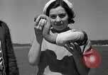 Image of goeduck clam digging Tacoma Washington USA, 1935, second 41 stock footage video 65675037671