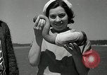 Image of goeduck clam digging Tacoma Washington USA, 1935, second 42 stock footage video 65675037671
