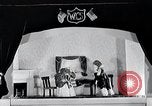 Image of puppet show fundraiser during depression New York United States USA, 1932, second 52 stock footage video 65675037689