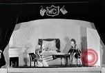 Image of puppet show fundraiser during depression New York United States USA, 1932, second 58 stock footage video 65675037689