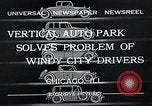 Image of vertical auto park Chicago Illinois USA, 1932, second 9 stock footage video 65675037690