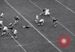 Image le football United States USA, 1935, de la seconde 28 séquences d'archives historiques vidéo 65675037727