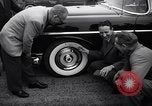 Standbild Firestone Nachweis REIFENPANNE REIFEN United States USA, 1955, aus Sekunde 18 historischem Filmmaterial Videoclip 65675037736
